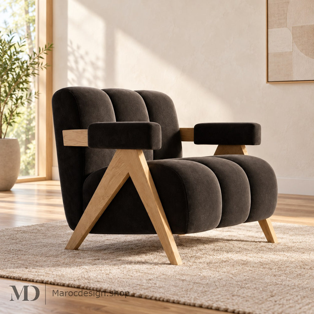 Fauteuil MAJESTIC anthracite avec piètement bois dans un intérieur lumineux