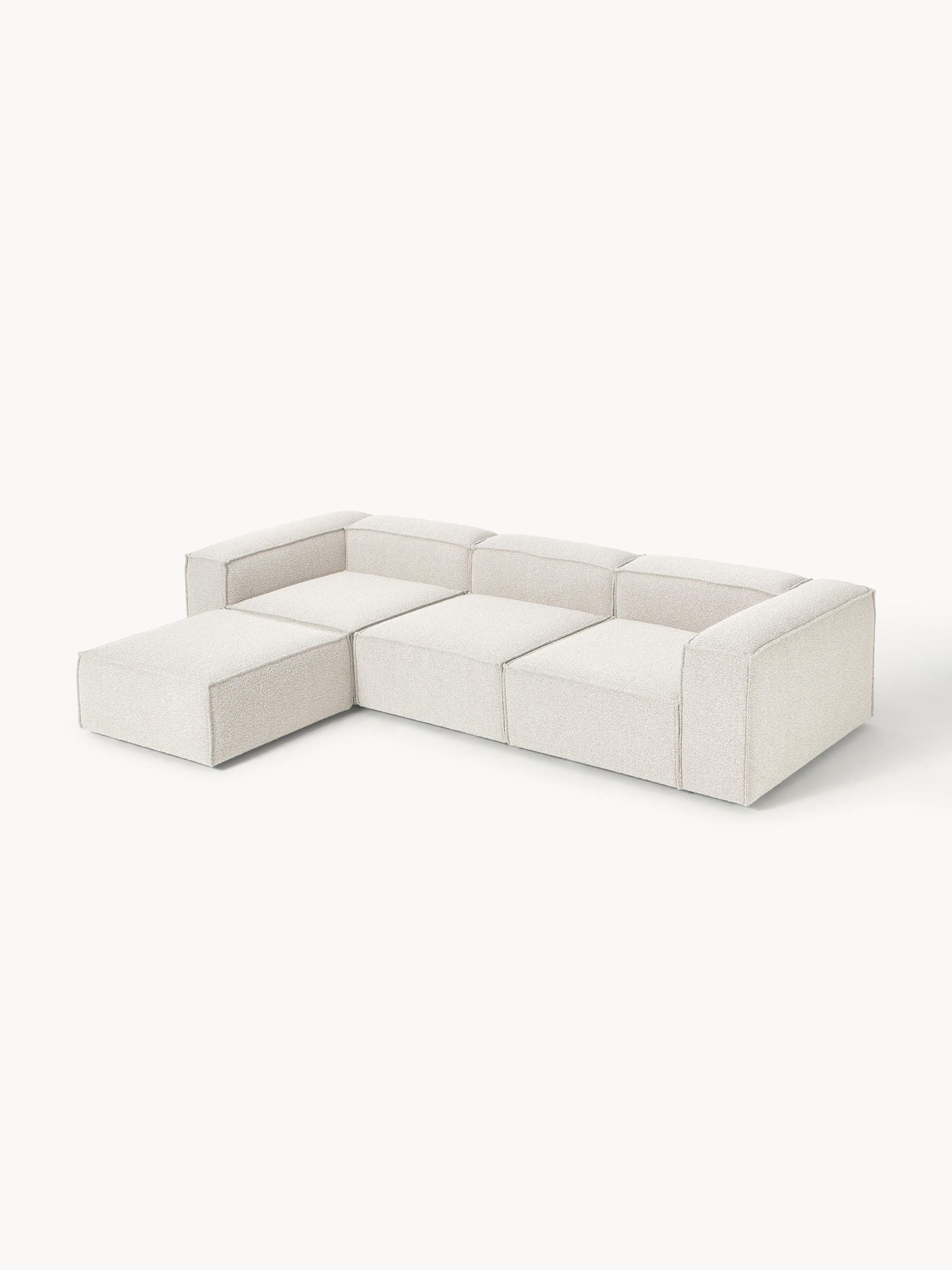 Canapé modulable 4 places en tissu bouclé avec pouf