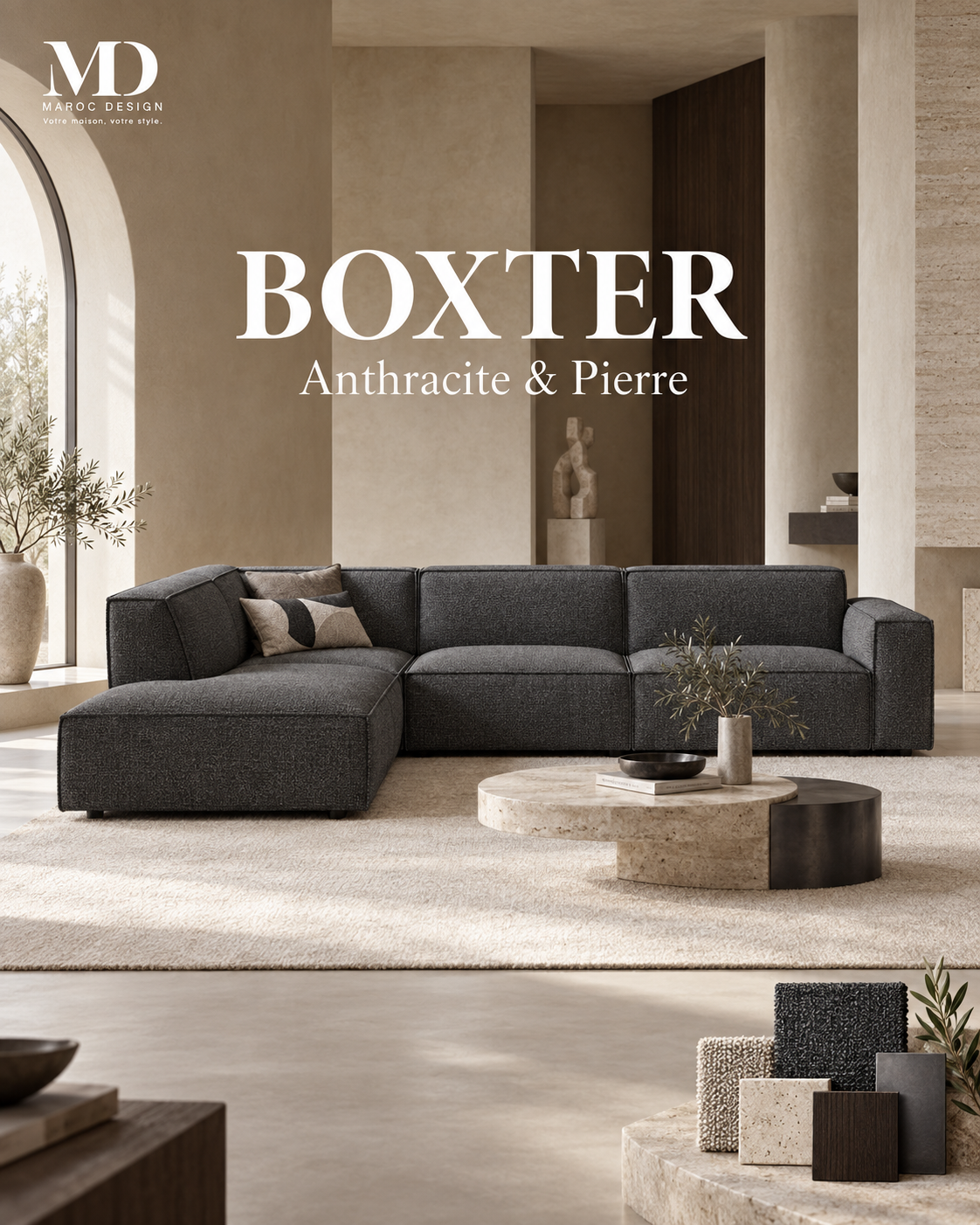 Canapé d'angle BOXTER en tissu gris anthracite dans un salon minéral, table basse en pierre – Collection BOXTER Maroc Design