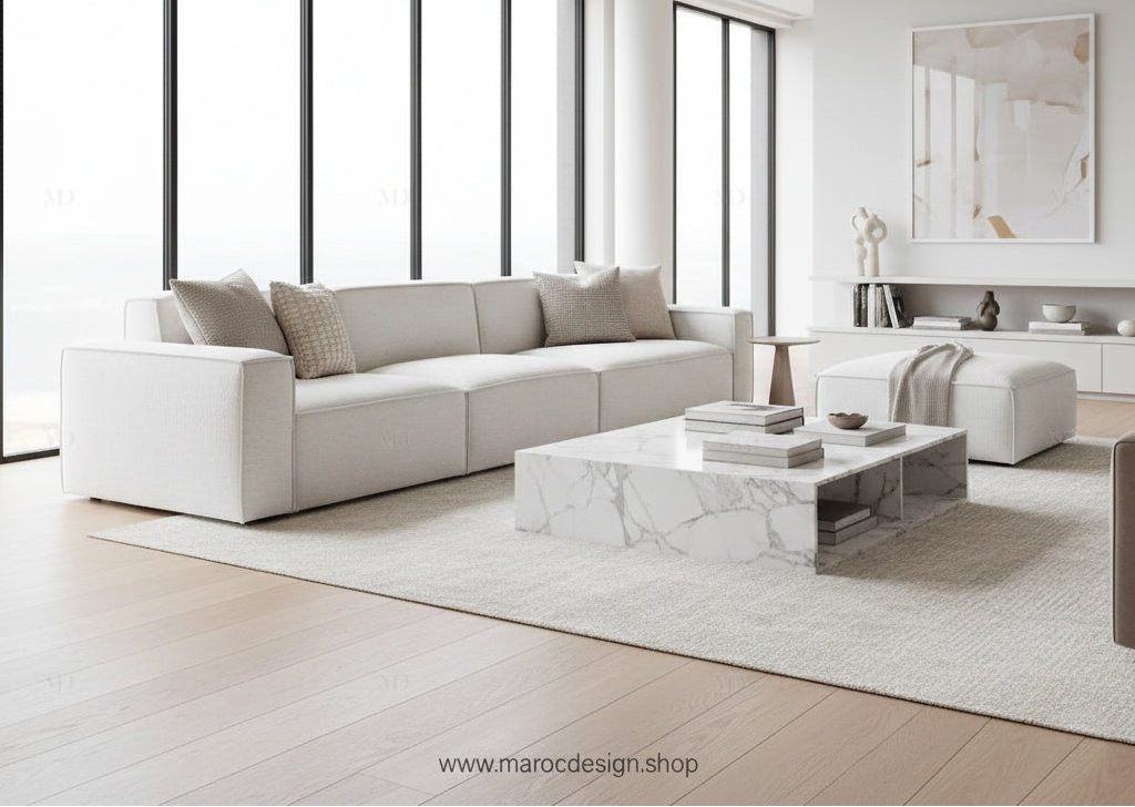 Canapé droit modulaire blanc crème et grand salon minimaliste, mobilier de luxe Maroc Design Casablanca.