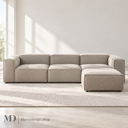 Canapé MALMO beige avec pouf à droite de l’image en intérieur lumineux — Maroc Design
