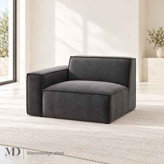 Module BOXTER anthracite avec accoudoir à gauche de l’image en intérieur lumineux — Maroc Design