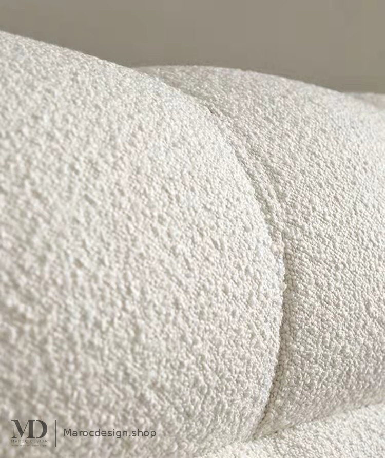 Gros plan sur le tissu bouclette écru du lit CLOUD – Maroc Design