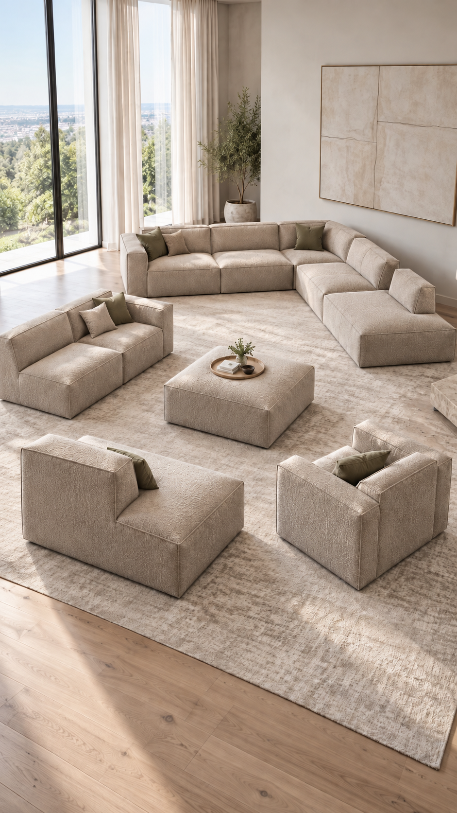 Collection BOXTER beige : canapé d’angle, modules individuels et pouf dans un salon lumineux